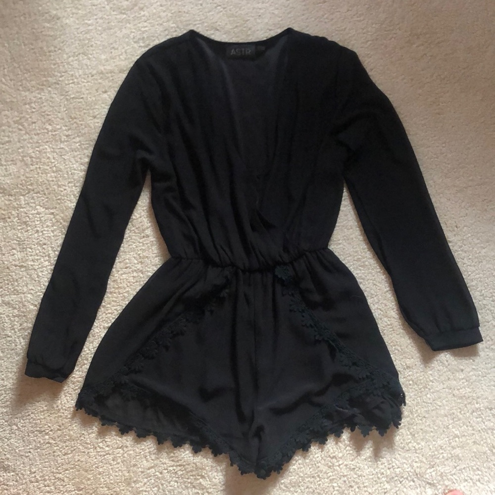 ASTR long sleeved black romper!